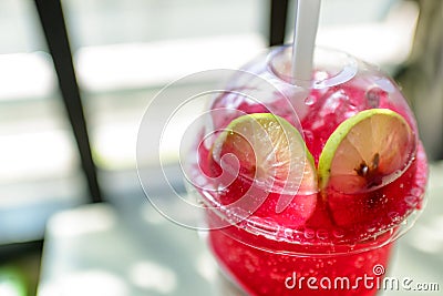 Red soda, clear glass, lemon, Stock Photo