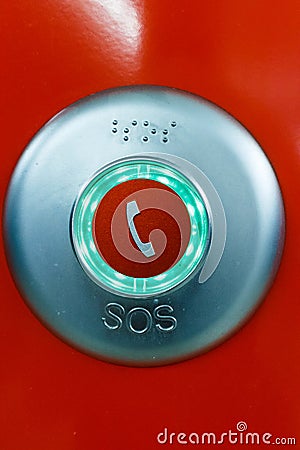 Red SOS emergency telephone button Stock Photo