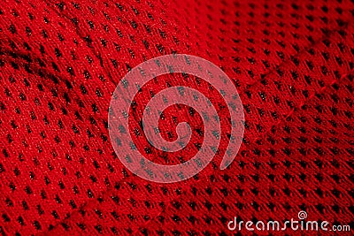 Red sportswear closeup top view. seam and juncture. breathable knitwear. clothing details macro Stock Photo