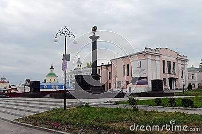 Red Square in the town of Yelets. Stela in honor of conferring the title of `City of Military Glory` Editorial Stock Photo