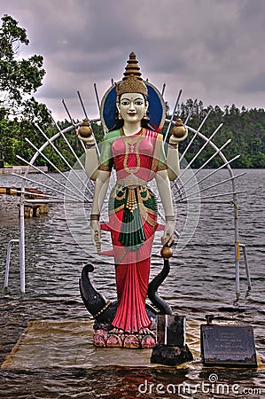 Statue of Hindu God in Shiv Mandir on Mauritius Editorial Stock Photo