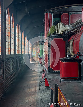 Red Steam Locomotive. Engine shed. Stock Photo