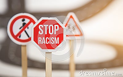 red stop sign. no racism, stop discrimination based on race religion gender . Promotion of equal rights and equal Stock Photo