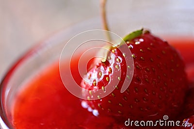 The red strawberry is a juicy and the most sumptuous fruit with a lot of vitamins. Stock Photo
