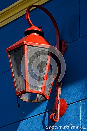 red street lamp and a blue yellow Stock Photo