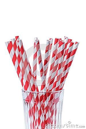 Red striped papaer straws in glass Stock Photo