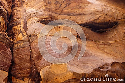 Red striped rock texture in Wadi Mujib canyon in Jordan Stock Photo