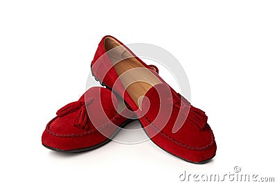 Red suede woman`s moccasins shoes isolated on white Stock Photo