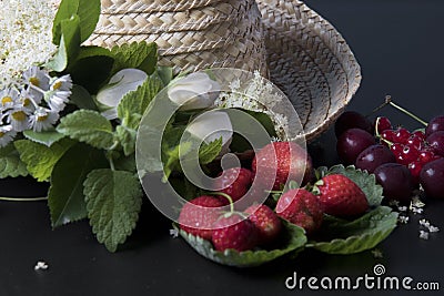 Summer fruits straw hat Stock Photo