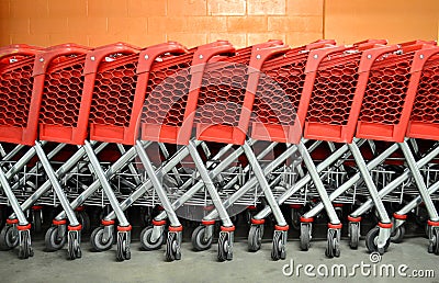 Red Supermarket Trolleys Stock Photo