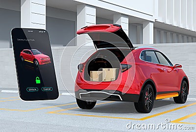 Red SUV in parking lot with opened trunk, cardboard boxes inside Stock Photo