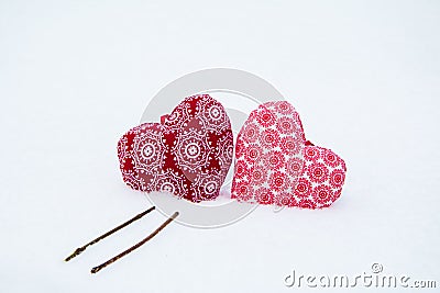 Red symbol of equal and love on snow background Stock Photo