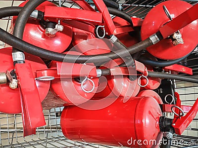 Red tank of fire extinguisher. Overview of a powerful industrial fire extinguishing system. Emergency equipment for industrial Stock Photo