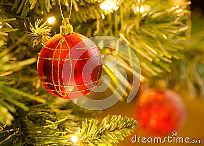 Red Tartan Bauble on Christmas Tree Stock Photo