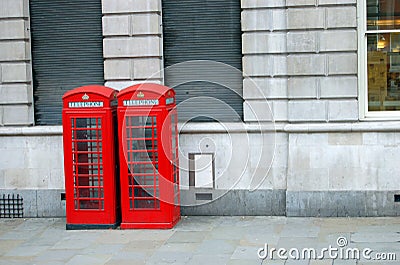 Red Telephone Booths on streets of London Stock Photo