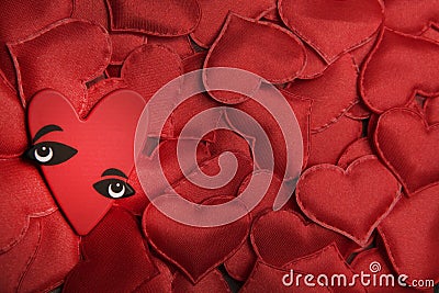 Red textile heart dark background Stock Photo