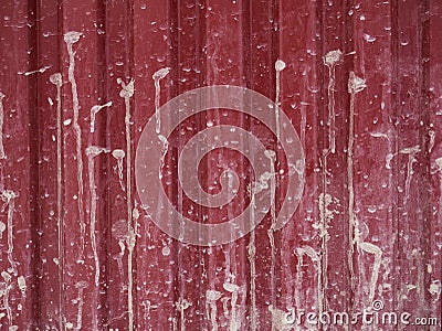 Red texture of the fence with gray dirt Stock Photo