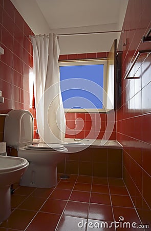 Red tiled bathroom Stock Photo