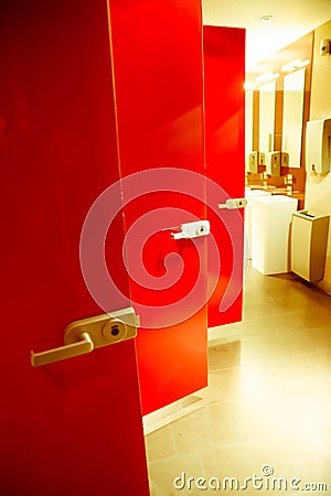 Red toilet doors Stock Photo