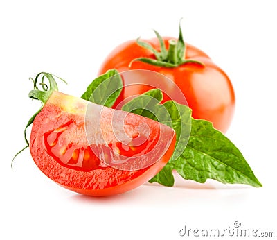 Red tomato vegetable with cut and green leaves Stock Photo