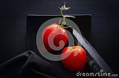 Red Tomatoes and Japanese Knive Stock Photo