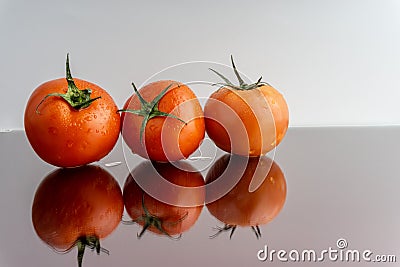 Red tomatoes on white background Stock Photo