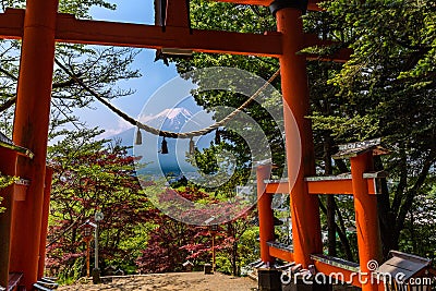 red tori gate with Mount Fuji at Chureito pagoda, kawaguchiko, Japan Stock Photo