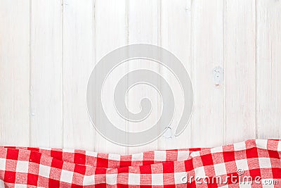 Red towel over wooden kitchen table Stock Photo