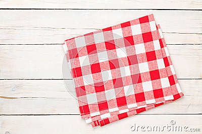 Red towel over wooden kitchen table Stock Photo