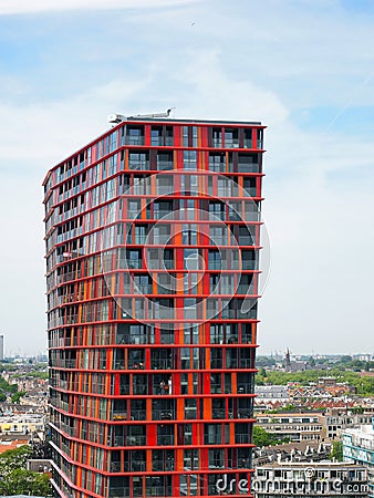 Red tower of Calypso building n Rotterdam Editorial Stock Photo