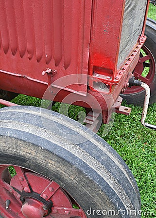 Antique red tractor front end Stock Photo