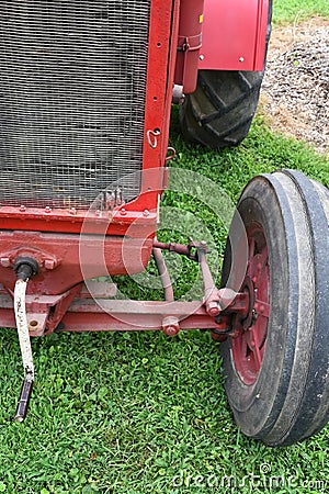 Red tractor front axle view Stock Photo