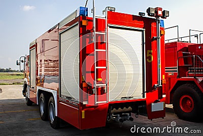 Red truck firefighter automobiles at airport Stock Photo