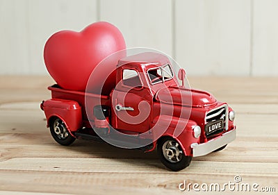 Red Truck and heart, ready to delivery love on Valentine`s day Stock Photo