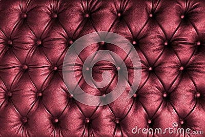 Red tuffted leather with buttons Stock Photo