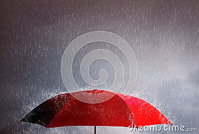 Red umbrella against the storm, sky background and black cloud group and rain, thunderstorm with savings and investment, life and Stock Photo