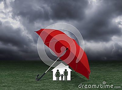 Red umbrella covering home and family under rain, insurance Stock Photo