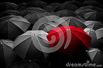 Red umbrella stand out from the crowd. Different, leader. Stock Photo