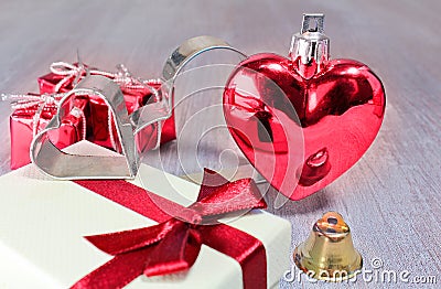 Red valentine or christmas heart and gifts with small jingle and Stock Photo