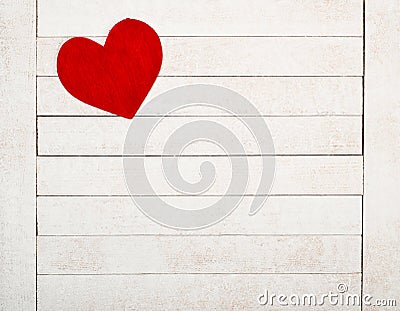 A Red Valentines Day Heart on Rustic White Wood Boards Background with room or space for copy, text or your words. It`s a horizo Stock Photo