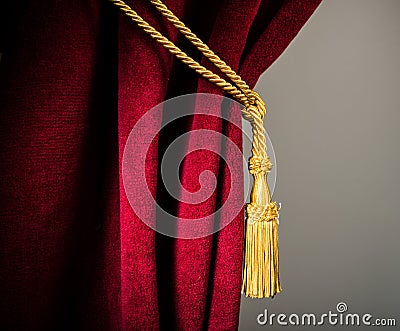 Red velvet curtain with tassel Stock Photo