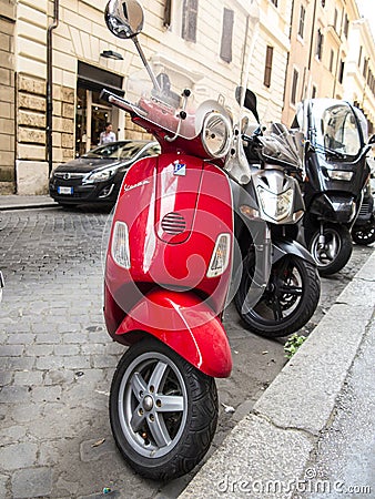 Red Vespa scooter Editorial Stock Photo