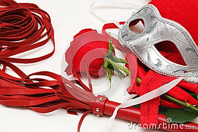 Whip and a rose Stock Photo