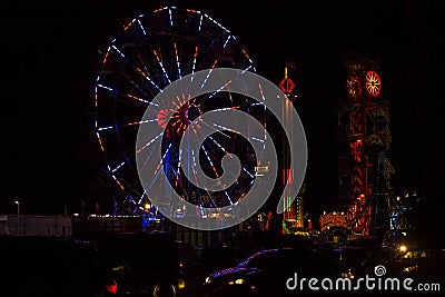 Red, White and Blue July 4th Festival Ferris Wheel at Night Stock Photo