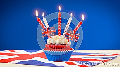 Red white and blue theme cupcakes and cake stand with UK Union Jack flags Stock Photo
