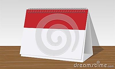 Red and white calendar on wooden desk Stock Photo