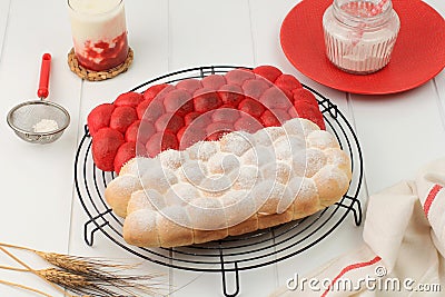 Red and White Chigiri Bubble Bread, Fresh Viral White Japanese Bread, Top View on Black Background Stock Photo