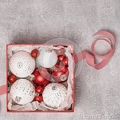 Red and white Christmas baubkes in a box Stock Photo