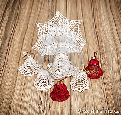 Red and white crochet christmas angel and bells Stock Photo