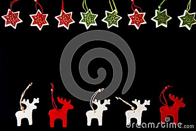 Red and white felt reindeers and snowflakes Stock Photo